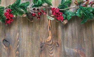 Christmas decor on the wooden background photo