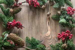 Christmas decor on the wooden background photo