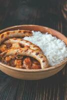 Thai red curry with sausages photo
