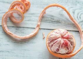 Peeled grapefruit flat lay photo