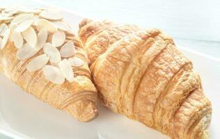 Croissants on the white plate photo