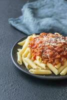 Portion of penne with arrabbiata sauce photo