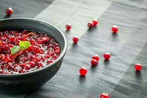 Bowl of homemade cranberry sauce photo