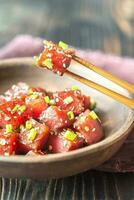 Bowl of poke - traditional Hawaiian dish photo