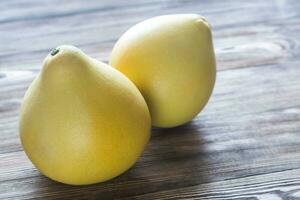 Two pomelos closeup photo