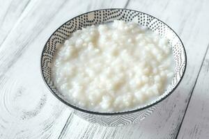 cuenco de congee - asiático arroz gachas de avena foto