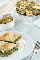 Portion of Spanakopita - Greek spinach pie photo