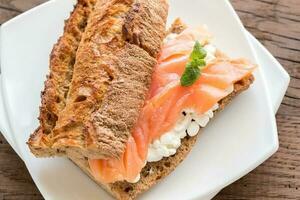 Sandwich with salmon and cheese photo