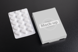 Pillbox with loaf of tablets on dark background psd