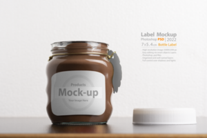 Hazelnut spread chocolate jar with round cap on black table psd