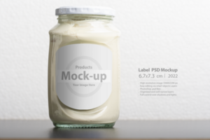 Whey glassy jar with round cap on black table psd