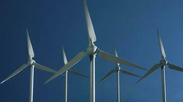Wind turbines with blue sky. Green energy. Renewable and sustainable resources. Electricity generation. 3d illustration photo