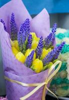 A bouquet of flowers that are made of soap. Soap bouquet, flower arrangement. For interior decoration or as a gift. photo