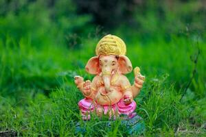 Indian Lord ganesha statue, idols of lord Ganesh for upcoming Ganapati festival in India. photo