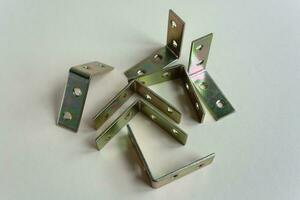 Galvanized hinge which are used for the production of soft furniture photo