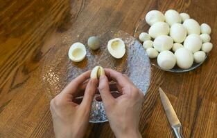 Step by step. egg cut in half, for making stuffed eggs photo