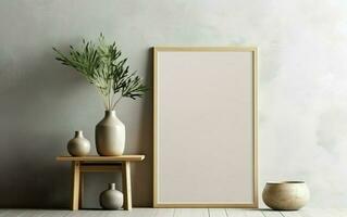 Blank vertical frame mockup for artwork or print on gray wall with green plants in vase, copy space, minimalist scandinavian design scene, modern interior mockup photo