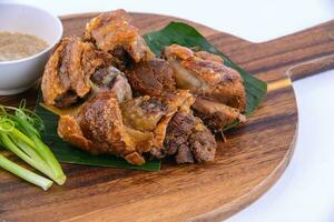 Deep fried Pork Knuckle on white background. photo