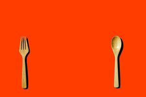 wooden spoon and fork, light and shadow Top view with space for your recipes. photo