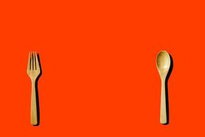 wooden spoon and fork, light and shadow Top view with space for your recipes. photo