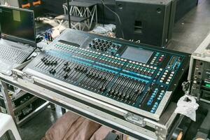 Sound audio mixer. General plan of sliders and buttons on a mixing console photo