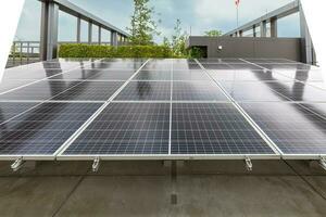 Solar panels or Solar cells on  rooftop or terrace. Can saving energy. Sun or renewable or Clean energy. photo