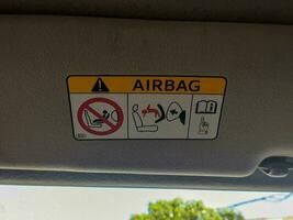 airbag warning instruction symbol in car photo