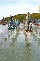 Beach umbrellas are in the sea. photo