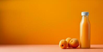 Peach smoothie isolated on peach background with a place for text photo