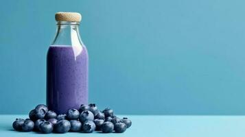 Blueberry smoothie isolated on background with a copy space photo