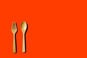 wooden spoon and fork, light and shadow Top view with space for your recipes. photo