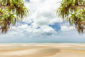 Tropical beach wave at Hua Hin Thailand in the morning.Background or wallpaper of clean sand and clear sea water that can be seen through photo