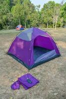 purple tent in open space The tent is not covered with a fire sheet photo