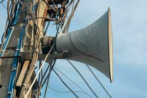 horn speaker on electric pole photo