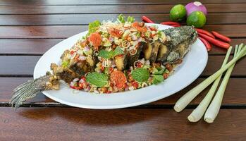 Fried Snakehead Fish in Spicy Herb Salad photo