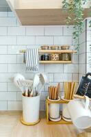 Minimalistic modern kitchen in pastel colors with kitchenware and space photo