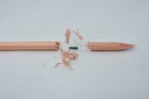 Broken pencil, close up of used pencil on white background with clipping path photo