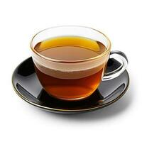 Caramel honey tea in a black cup isolated on white background photo