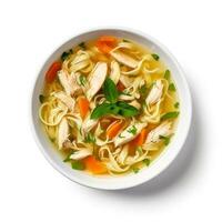 Classic chicken noodle soup isolated on white background photo