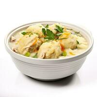 Cozy and comforting chicken and dumplings isolated on white background photo