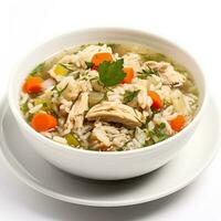 Classic and comforting chicken and rice soup isolated on white background photo