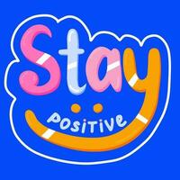 Stay positive hand drawn lettering on bright background. Calligraphic colorful lettering with idea for postcard, greeting card. Vector handwritten inspirational phrase for print, stickers, posters.