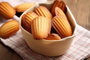 madeleines in the kitchen table Food Photography AI Generated photo