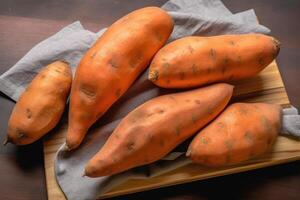 stock photo of sweet potato in kitchen table flat lay