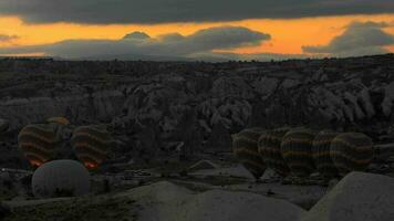 Preparations for Inflating Hot Air Balloons at Night Before Sunrise video