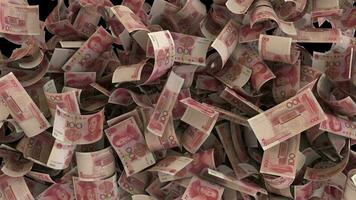 Dynamic Chinese Yuan money bills transition from the top and than exploding video