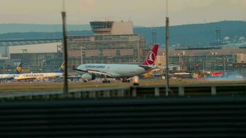 FRANKFURT AM MAIN, GERMANY JULY 21, 2017 - Turkish Airlines Cargo Airbus A330 TC JDS approaching and landing at 25C. Fraport, Frankfurt, Germany video