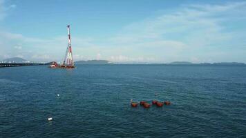 Rotating view sea piling work for cross-sea transmission line video