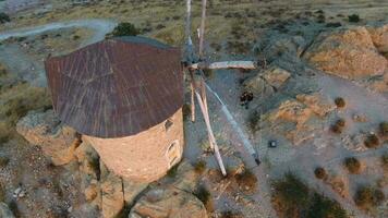 Old Traditional Historic Stone Windmill by the Sea at the Sunset video