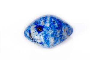 Macro mineral stone blue lapis lazuli afghanistan on white background photo